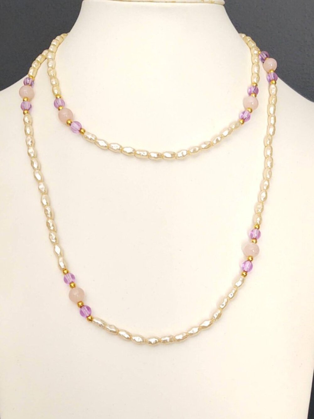 Faux pearl necklace with pink, purple and gold accent beads
